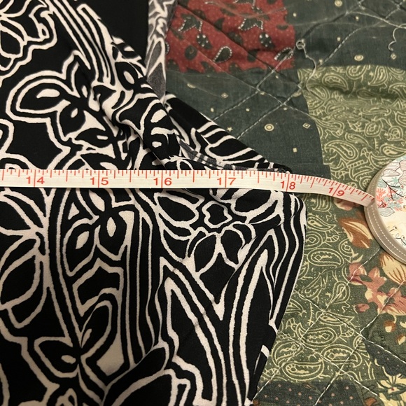 Sleeveless patterned dress with ruffle type top - Picture 10 of 16